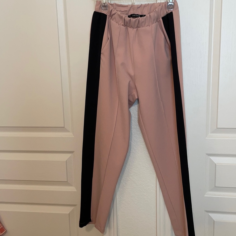 Pink/nude and black pants